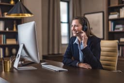 A foreclosure specialist taking a call